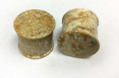Classic Plugs in Fossilized Coral
